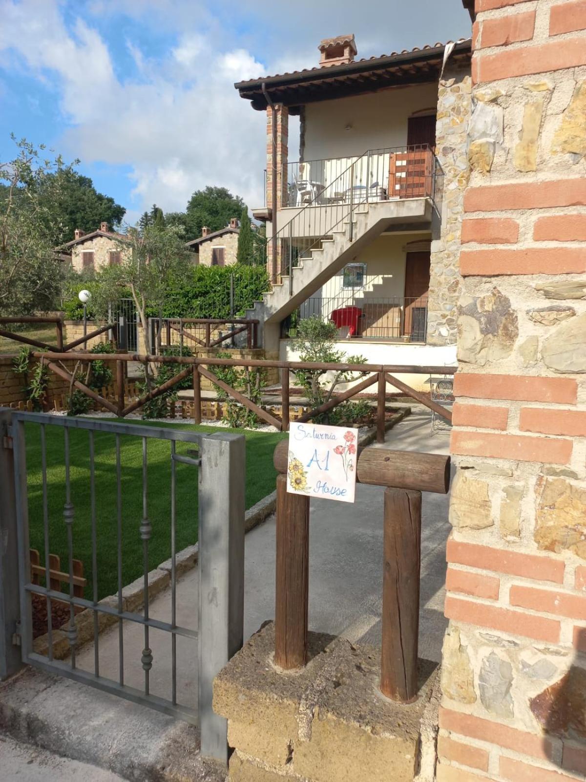 Апартаменты Saturnia House Поджио-Мурелла Экстерьер фото