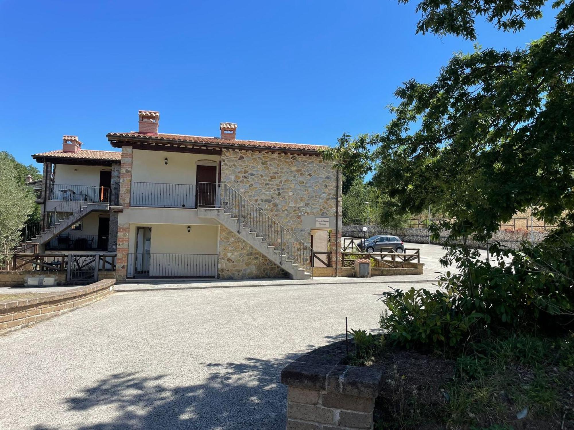 Апартаменты Saturnia House Поджио-Мурелла Экстерьер фото